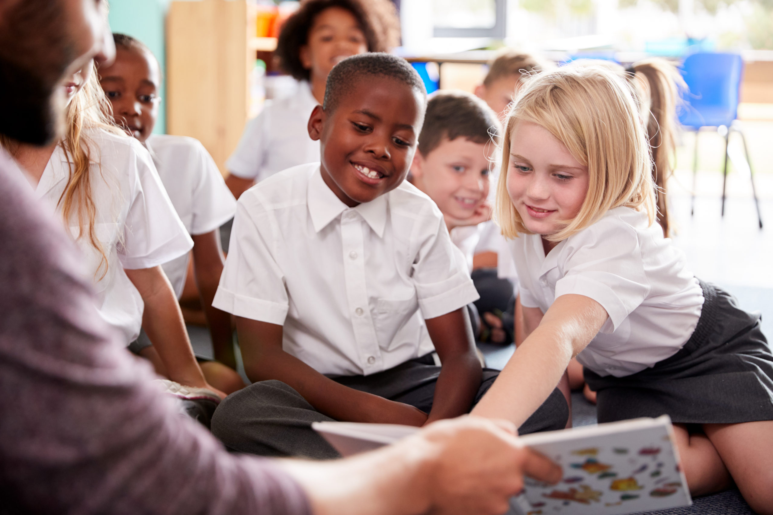 Students sitting in a classroom at Premier Learning Center for licensed childcare services.